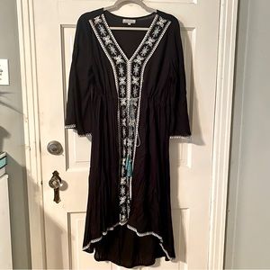 Women’s embroidered dress with high low hem
